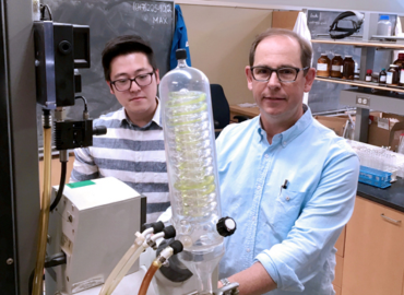 Graduate student Hyung Yoon with Professor Mark Lautens of chemistry
